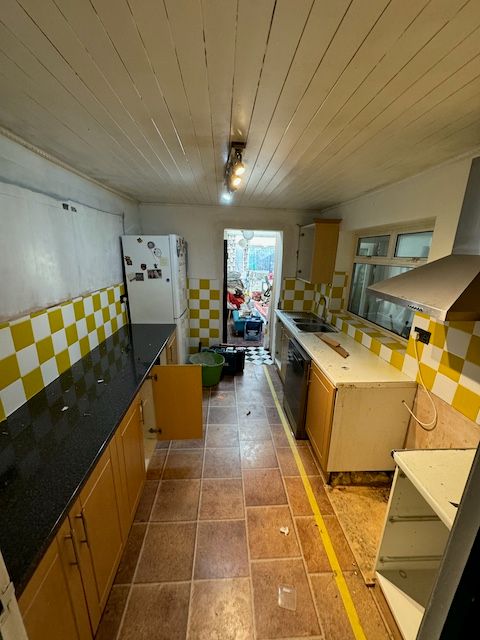 kitchen with empty counters and cabinets