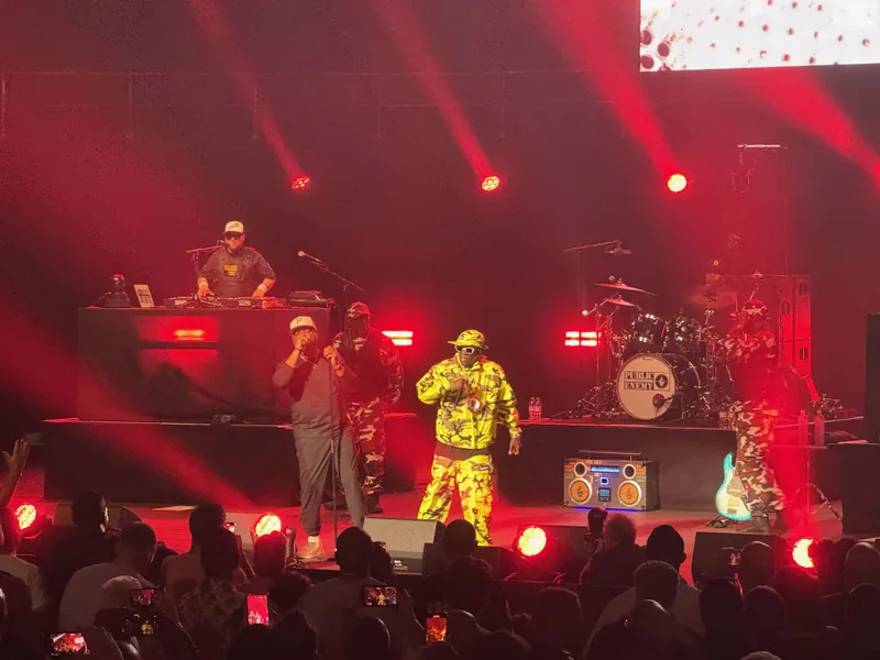 Chuck D joins Flava Flav on stage.
