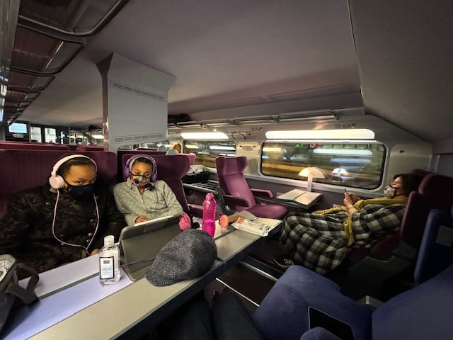 My family at a table on a train